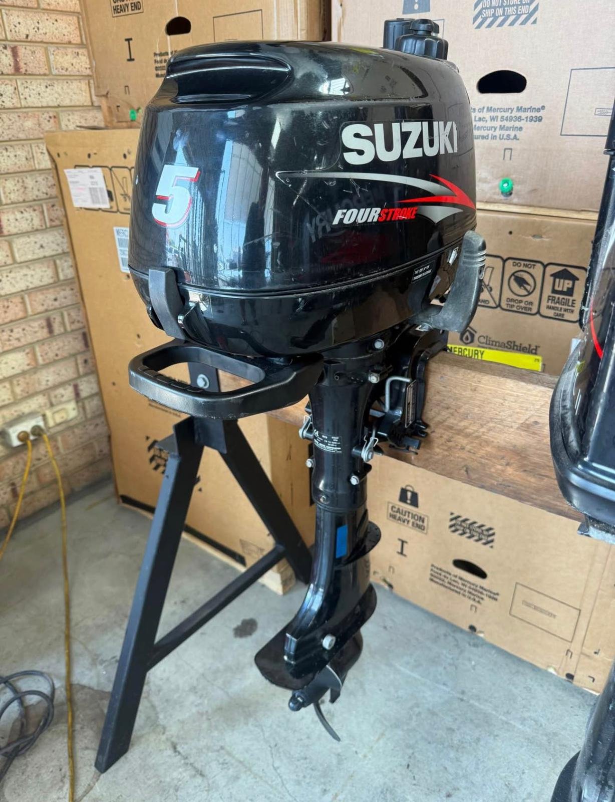 Used Suzuki 5hp outboard motor for sale